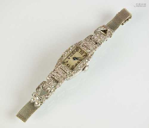 An Art Deco platinum and diamond cocktail wristwatch
