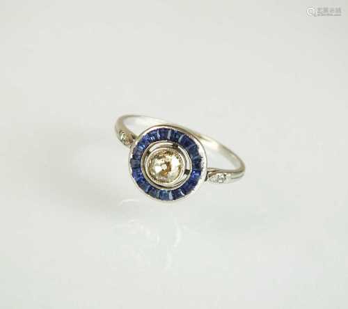 An Art Deco diamond and sapphire target ring, designed as a ...