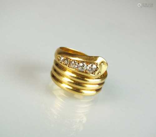 An 18ct gold diamond set snake ring