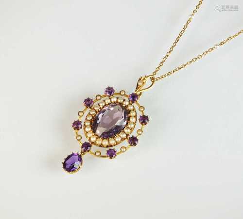 An early 20th century amethyst and seed pearl pendant on cha...