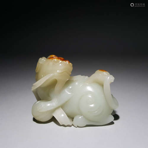 A Hetian Jade Carving Of A Lion