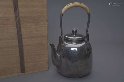 A Japanese Silver Loop-Handle Pot