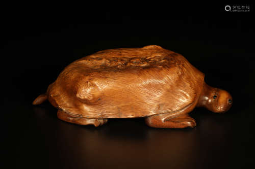 A Carved Burlwood Turtle-Form Ornament