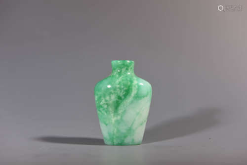 A Carved Jadeite Snuff Bottle