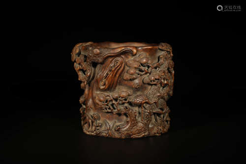 A Carved Eaglewood Pine, Bamboo And Plum Blossom Brush Pot
