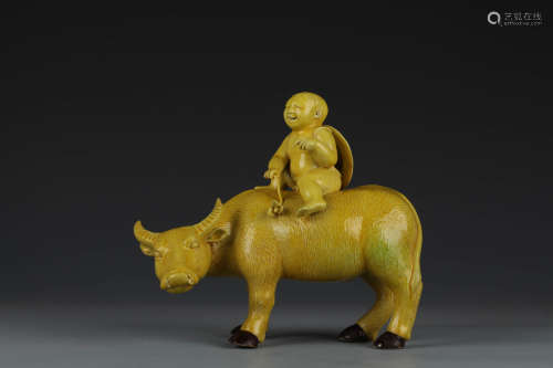 A Yellow-Glaze Porcelain Ox Herding Ornament