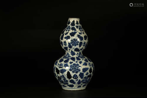 A Blue And White Floral Double-Gourd-Shaped Vase