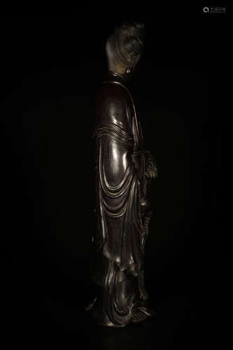A Carved Sandalwood Guanyin Ornament