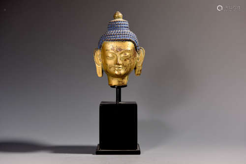 A Gilt Bronze Statue Of Buddha Head
