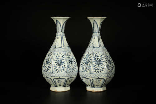 A Pair Of A Blue And White Floral Octagonal Vases