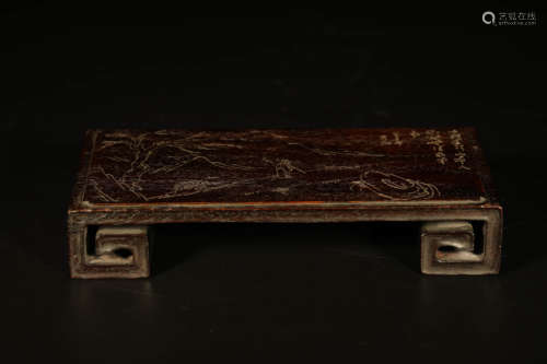 A Carved Sandalwood Scroll-Form Ink Rest