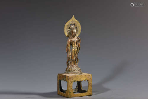 An Archaistic Gilt Bronze Buddha Statue