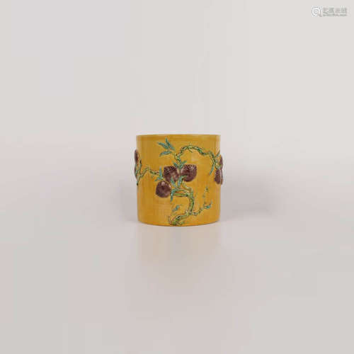 A Yellow-Glaze Relief-Decorated Nine Peaches Brush Pot