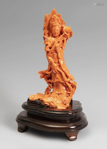 Guanyin. China, 20th century. Coral. With wooden