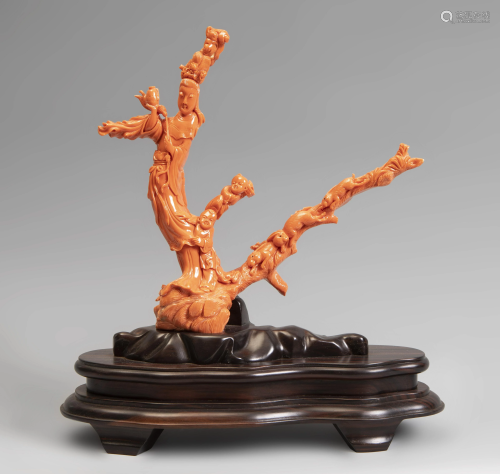 Set of three coral branches with an standing beauty, a