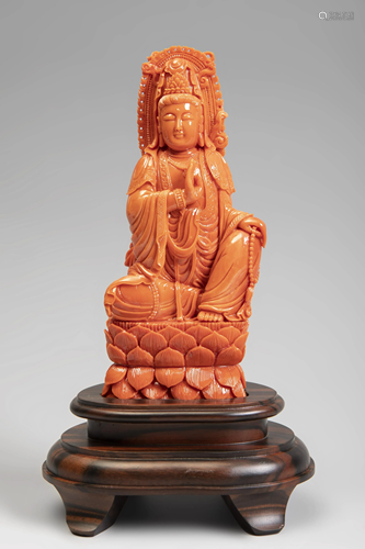 Guanyin sitting. China, 20th century. Coral.