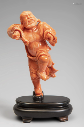 Fighter. China, 20th century. Coral. Base carved in