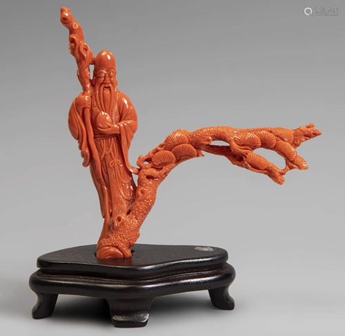 Fuhurokuju. China, 20th century. Coral. Wood base.