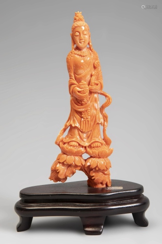 Guanyin; China, 20th century. Coral. With wooden