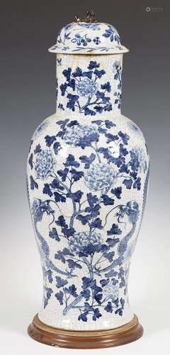 Vase. China, 19th century. Porcelain. With wooden