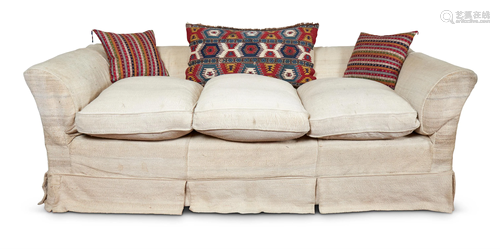 A LARGE HOWARD & SONS STYLE THREE SEAT SOFA