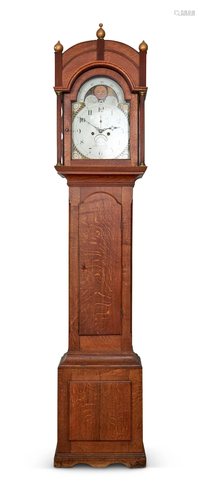 AN OAK LONGCASE CLOCK