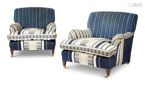 A PAIR OF HOWARD & SONS SYTLE UPHOLSTERED EASY CHAIRS