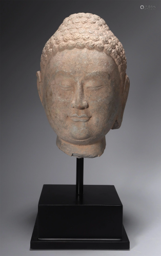 A Chinese Carved Stone Buddha Top