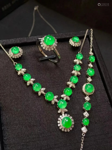 A Set of Chinese Carved Jadeite Earrings and A Necklace