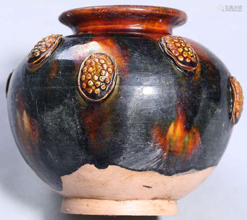 A Sancai-Glazed Relief-Decorated Pottery Jar