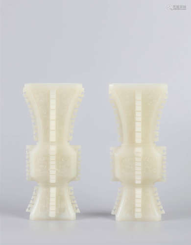 A Pair Of White Jade Beast-Faced Vases, Zun