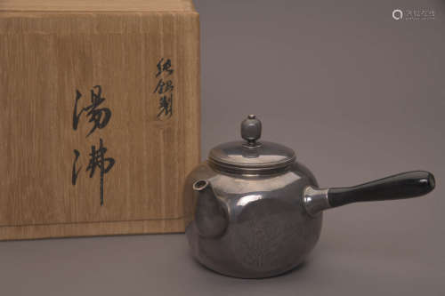 An Incised Japanese Silver Hand Teapot