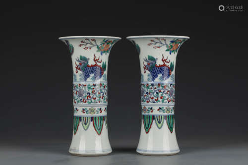 A Pair Of Blue And White Kylin And Phoenix Beaker Vases