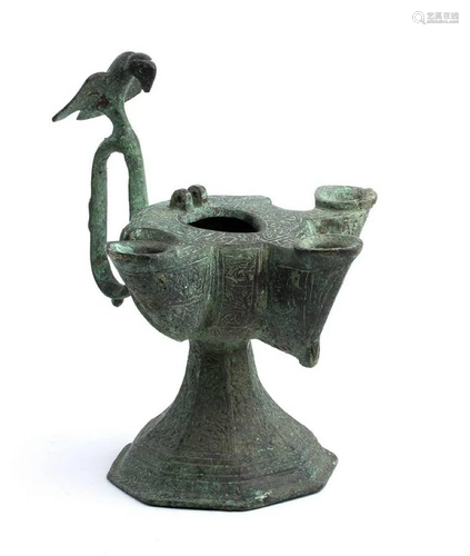 A TRIPLE-WICKED INCISED BRONZE OIL LAMP Iran, Khorasan,