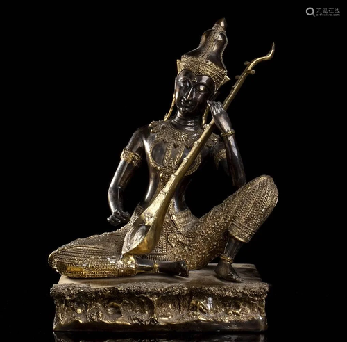 A PARTIALLY GILT BRONZE MUSICIAN Thailand, 20th century