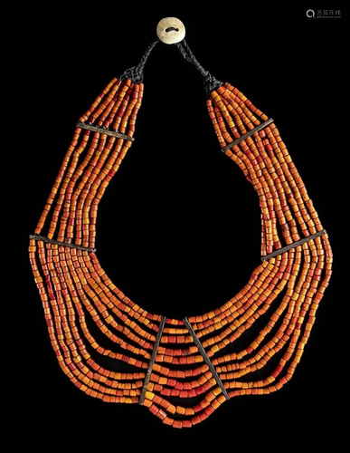 A BREAST NECKLACE WITH ORANGE BEADS