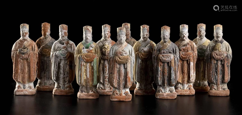 TWELVE PAINTED TERRACOTTA FIGURES WITH THE ZODIAC SIGNS