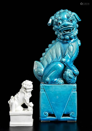 TWO GLAZED PORCELAIN BUDDHIST LIONS China, 20th