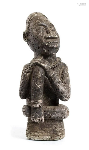 A STONE SEATED FIGURE Democratic Republic of the Kongo,