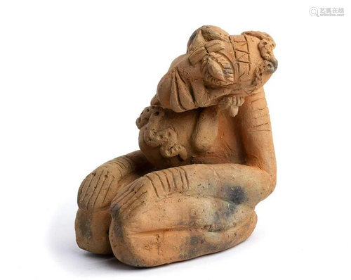 A DJENNÃ‰ TERRACOTTA KNEELING FIGURE Mali