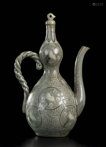 AN INLAID CELADON GLAZED CERAMIC HANDLED EWER Korea,