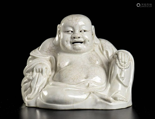 A 'BLANC DE CHINE' PORCELAIN SEATED BUDAI China, 2…