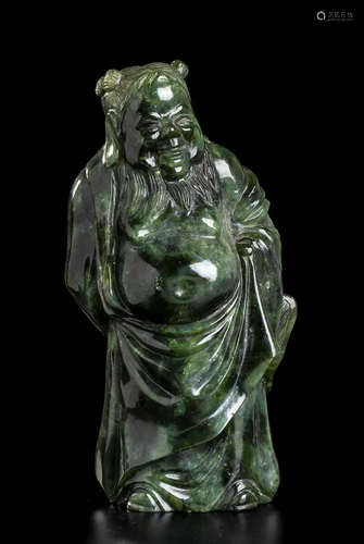 A GREEN JADE FIGURE OF A DEITY China, 20th century