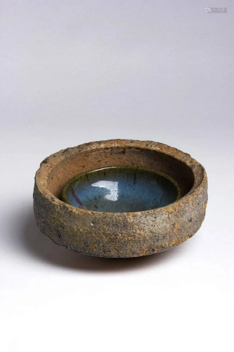 A SAGGAR CONTAINING A JUNYAO PURPLE-SPLASHED BOWL S…