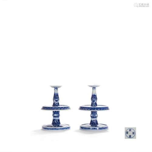 A Pair Of Blue And White Floral Candlesticks