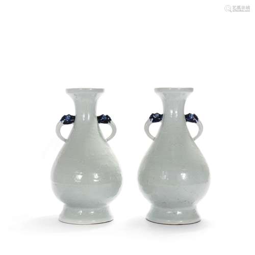 A Pair Of White-Glazed Incised Dragon Double-Eared Vases