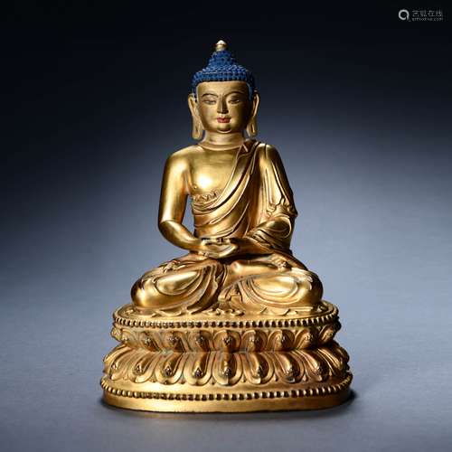 A Gilt Bronze Statue Of Shakyamuni