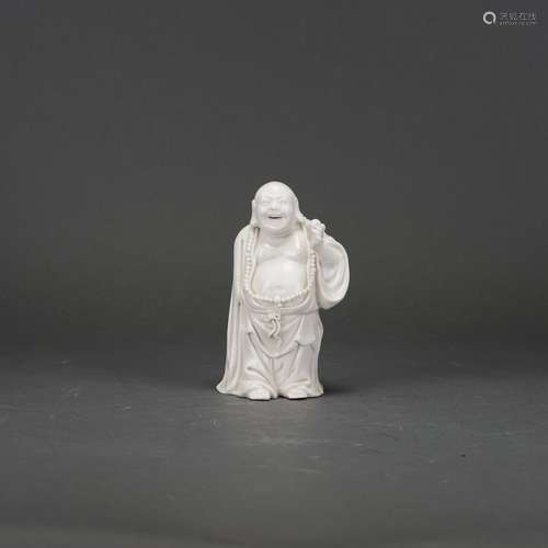 A DEHUA PORCELAIN FIGURE OF BUDDHA