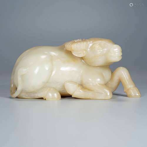 A Hetian Jade Carving Of An Ox