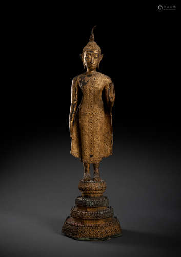 Auf einem Thron stehender Buddha Shakyamuni aus Bronze mit L...